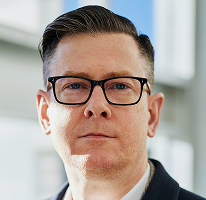 Alexander Hughes, CEO executivo numa empresa de trading de criptomoedas, retrato